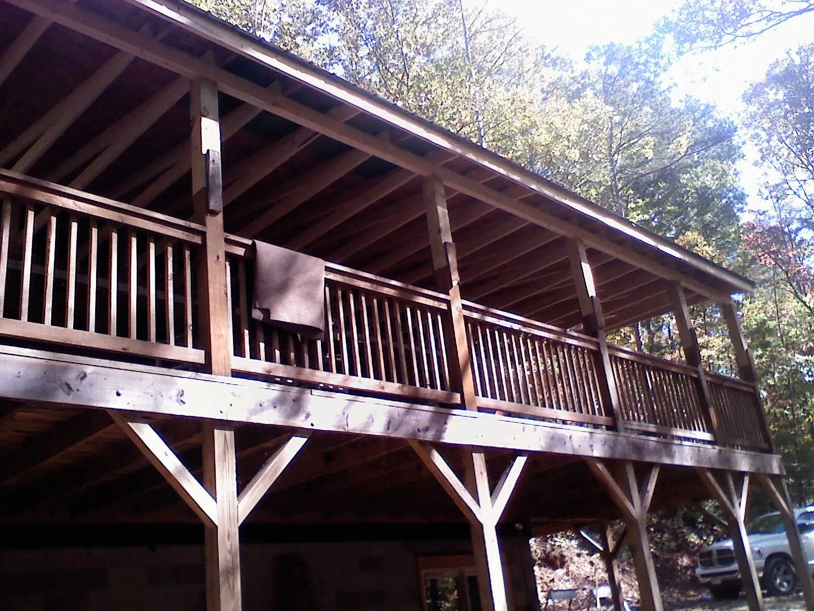 Timber framing under a new elevated porch and deck — Roof Leak Repair in Ace by Roofing Brothers
